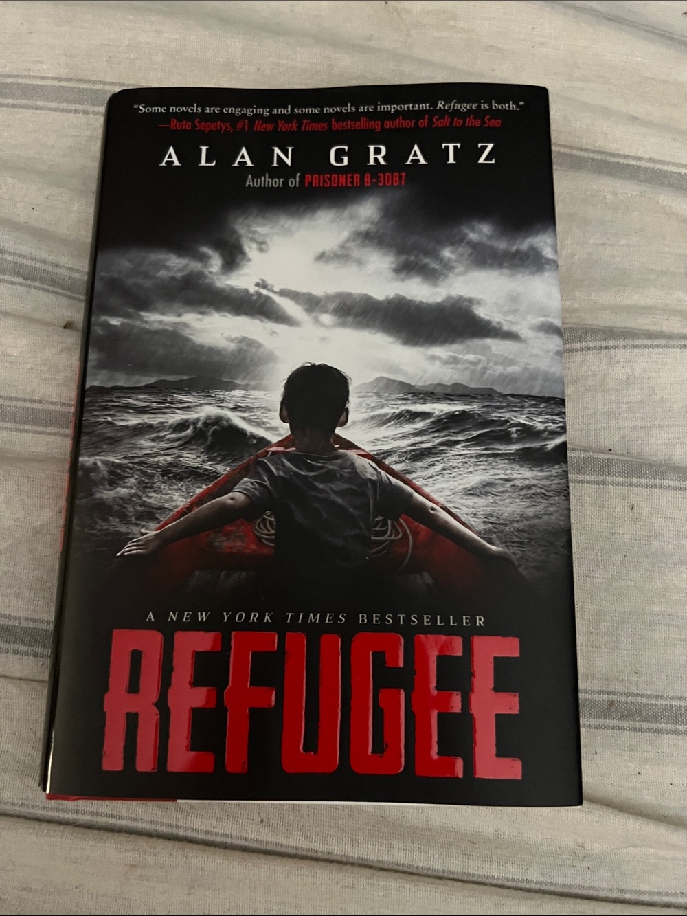 5/$10 item Refugee by Alan Gratz - Black & Red Hardcover Novel